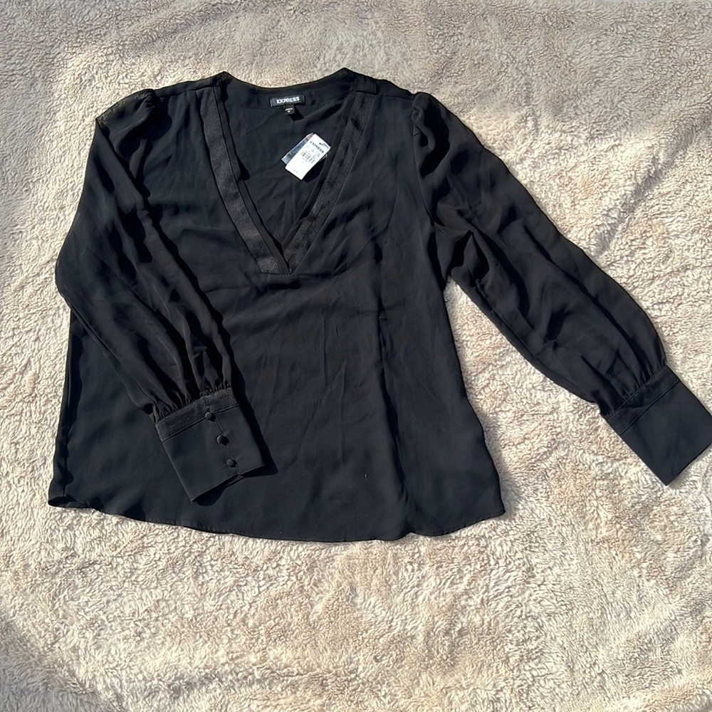 Fancy black light weight Express brand new NWT. Buttons on cuff.  Size large.